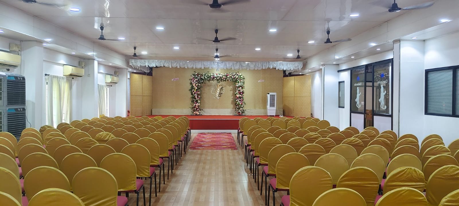 Third floor hall with orange stage décor